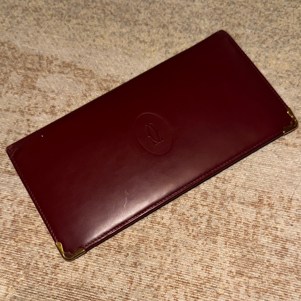 Cartier Deep Red Leather Checkbook Wallet with Gold Details